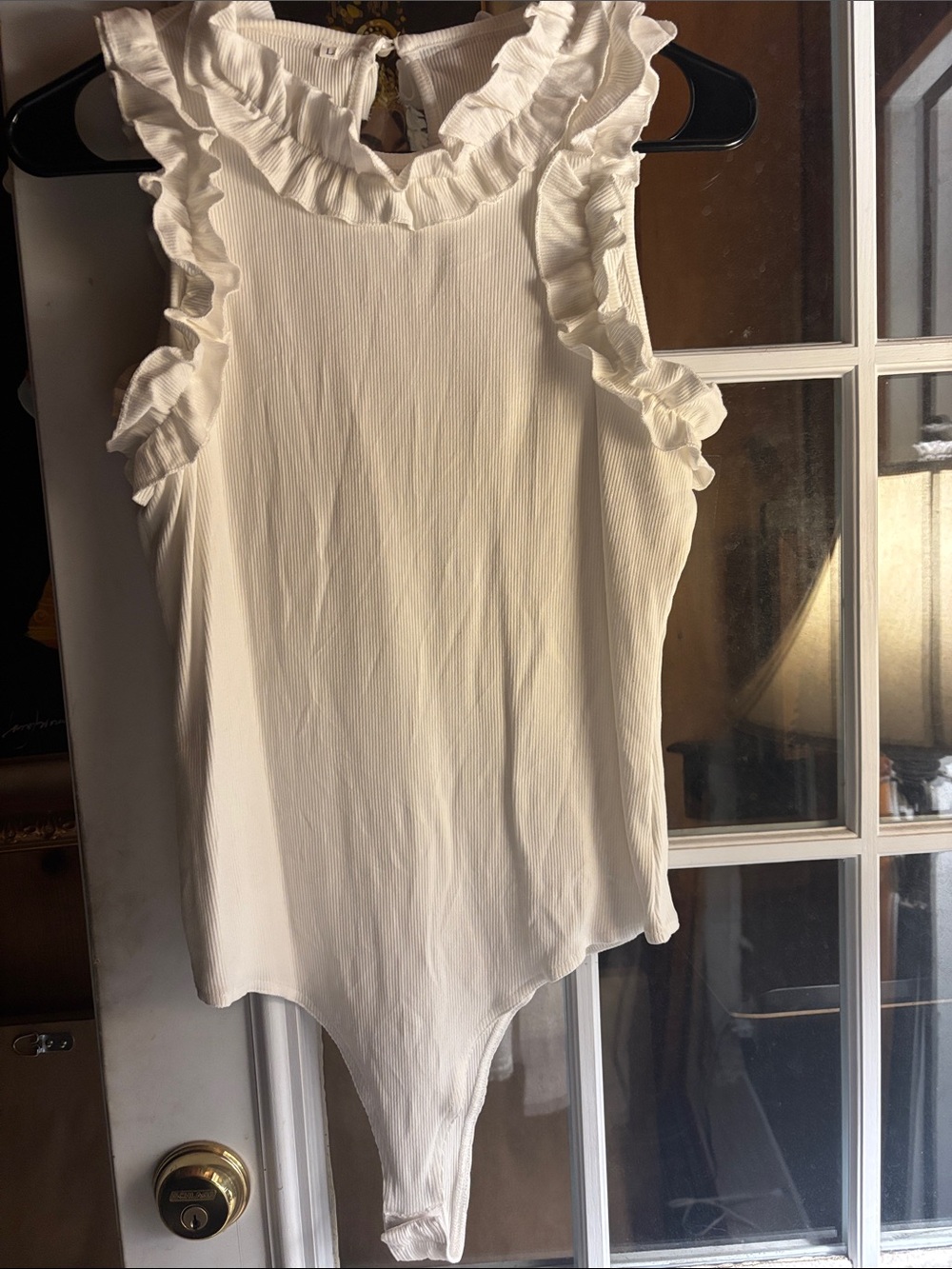 White Ruffled Sleeveless Bodysuit